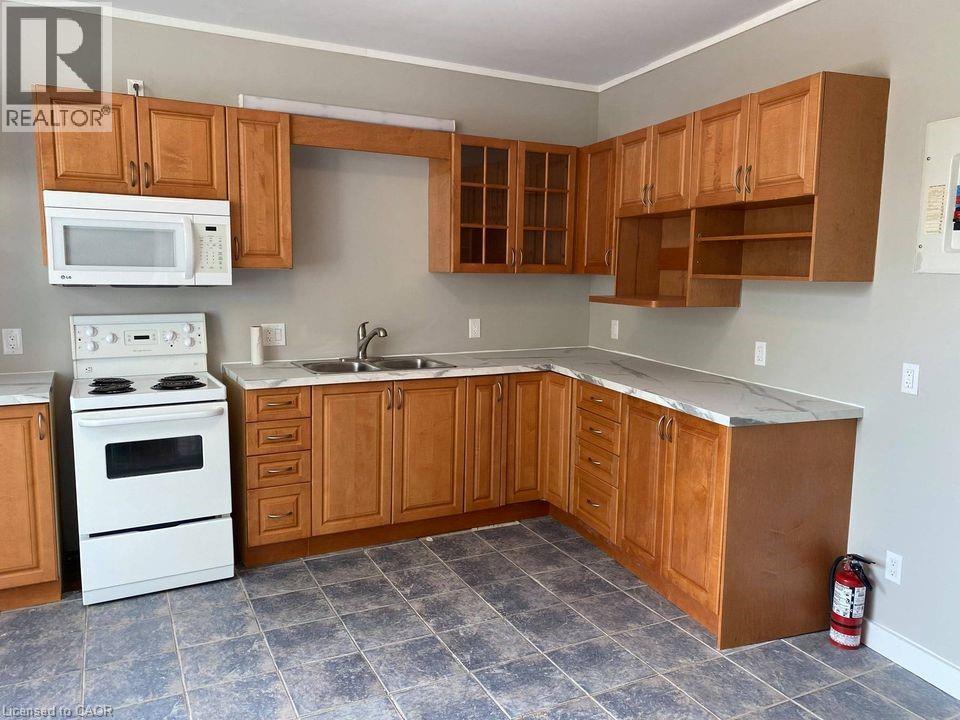 249-253 Church Street, St. Catharines, ON - Indoor Photo Showing Kitchen With Double Sink