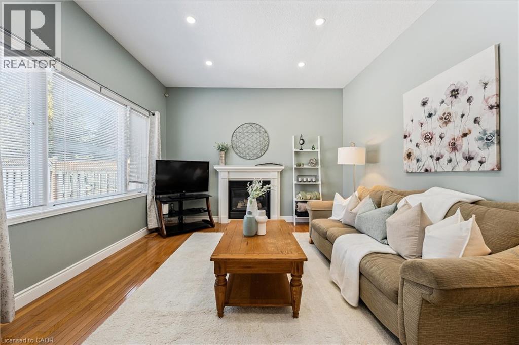 171 Endeavour Drive, Cambridge, ON - Indoor Photo Showing Living Room With Fireplace