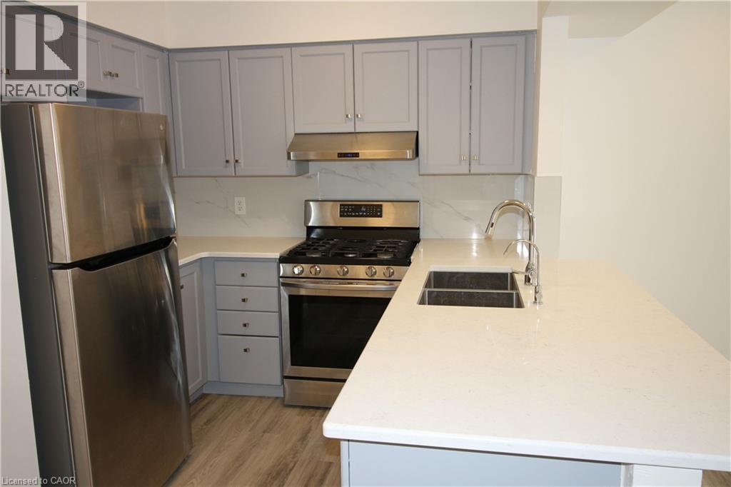 532 Mariner Drive, Waterloo, ON - Indoor Photo Showing Kitchen With Double Sink