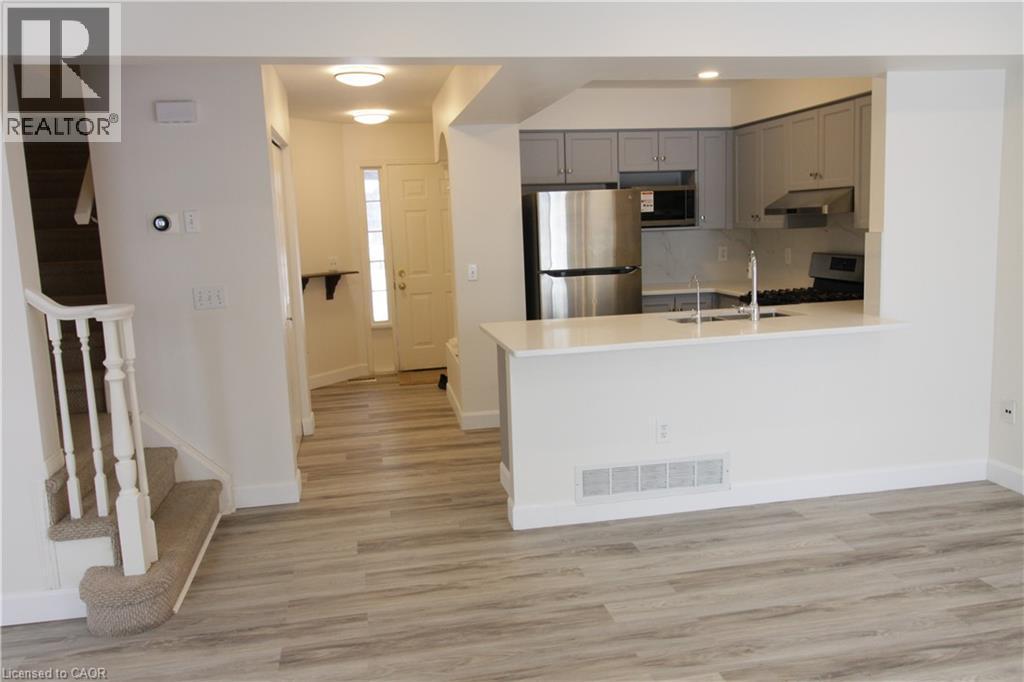 532 Mariner Drive, Waterloo, ON - Indoor Photo Showing Kitchen With Double Sink