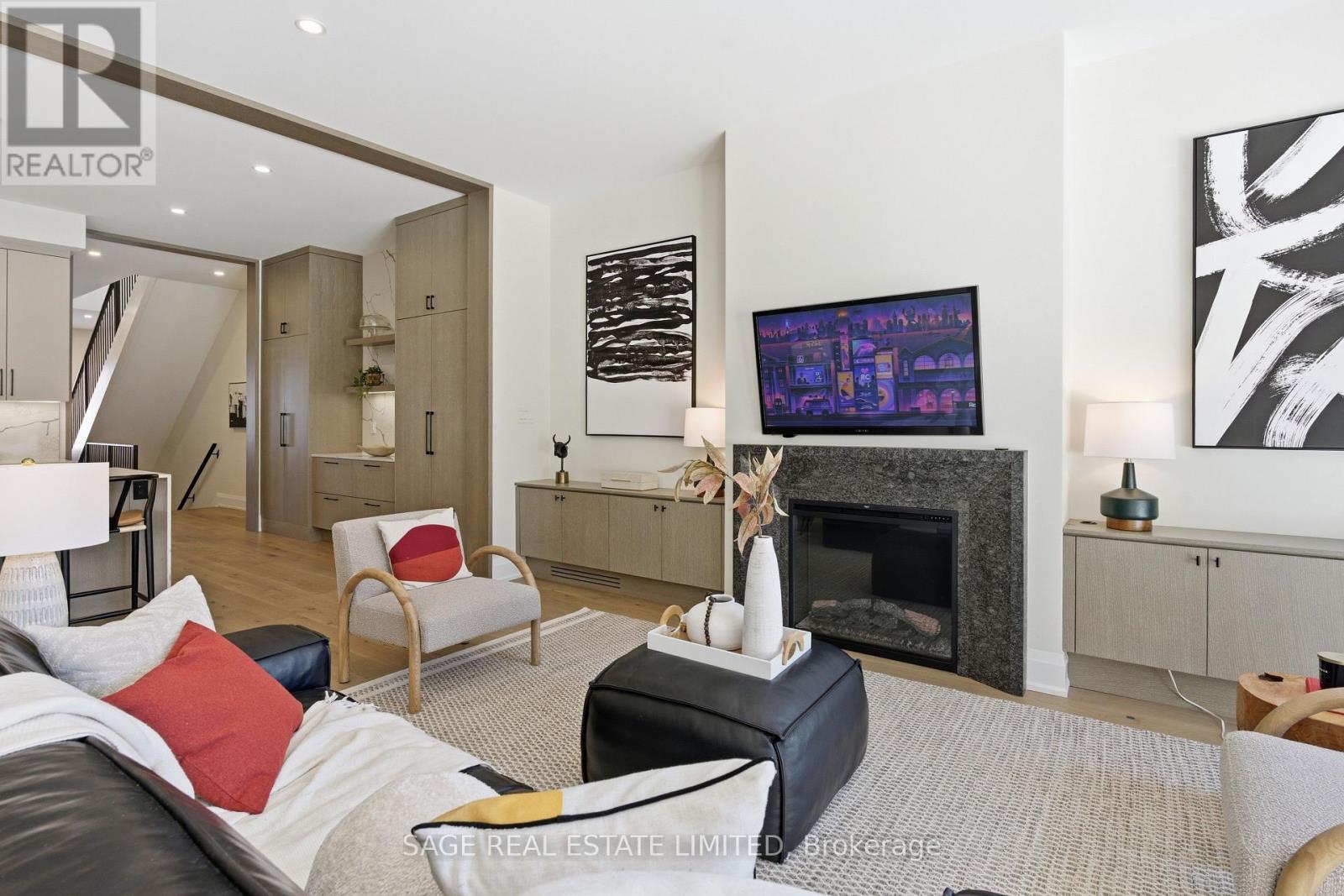 10 Brant Avenue, Mississauga, ON - Indoor Photo Showing Living Room With Fireplace