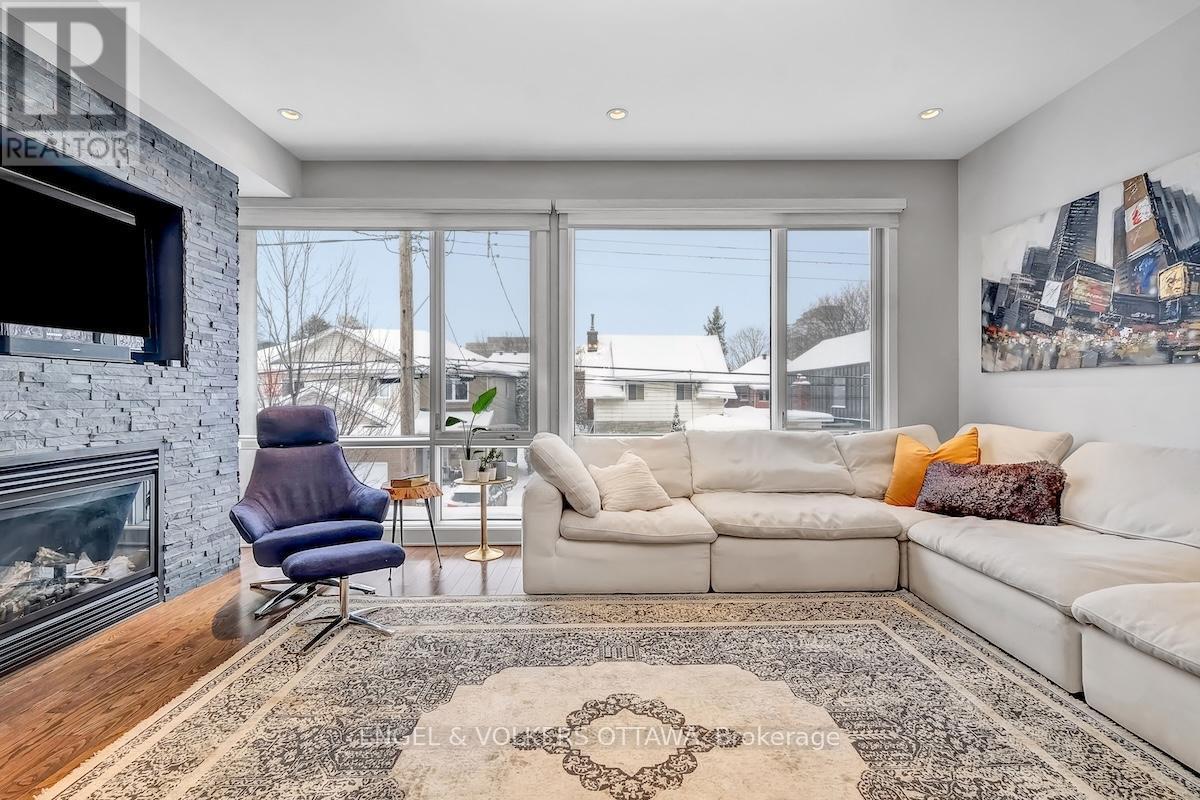32 Sims Avenue, Ottawa, ON - Indoor Photo Showing Living Room With Fireplace