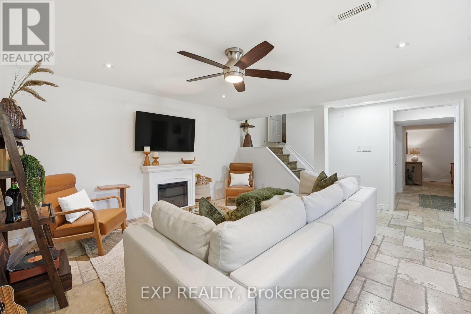 1 - 19 Bartlett Avenue, Grimsby, ON - Indoor Photo Showing Living Room With Fireplace