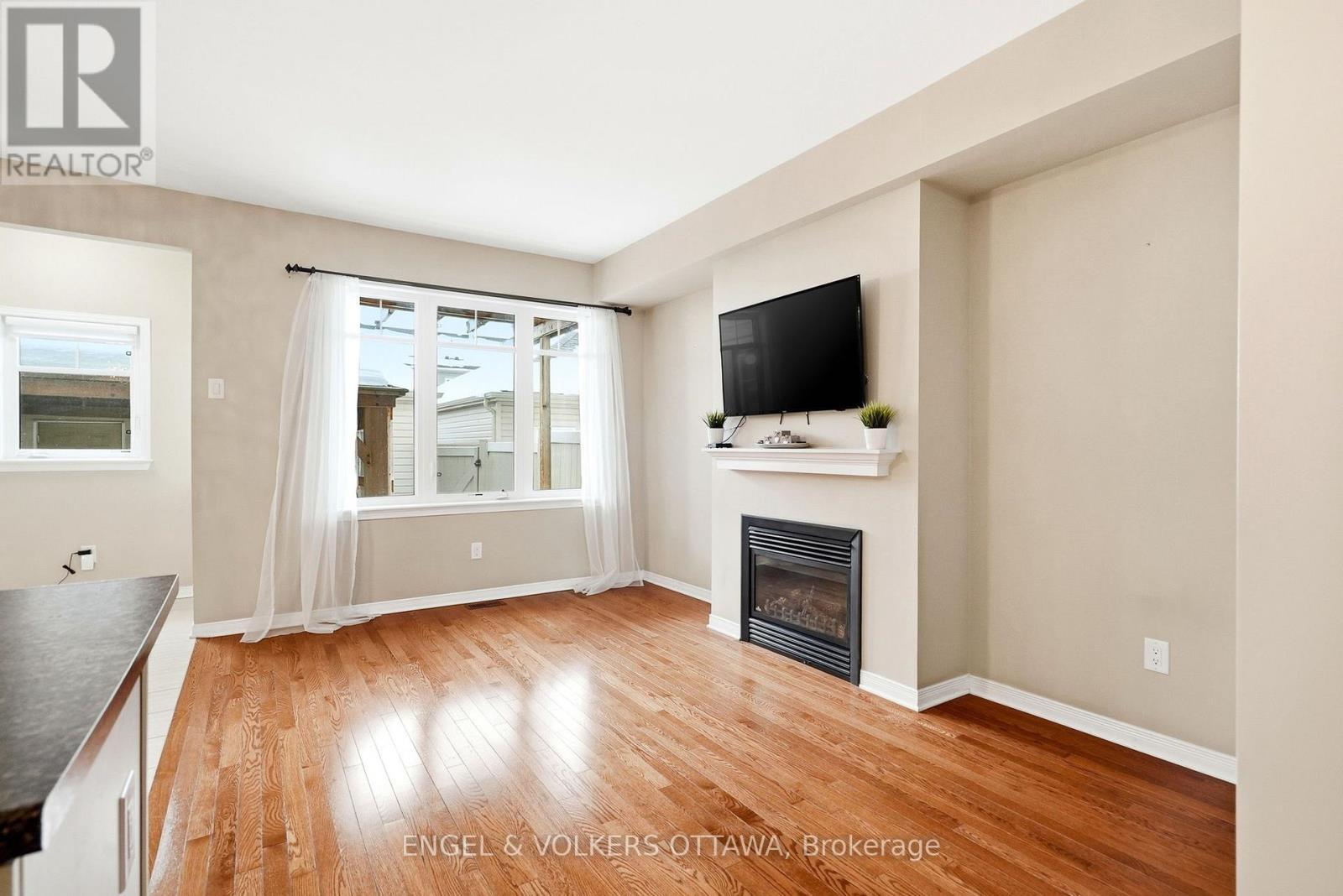 222 Longfields Drive, Ottawa, ON - Indoor Photo Showing Living Room With Fireplace