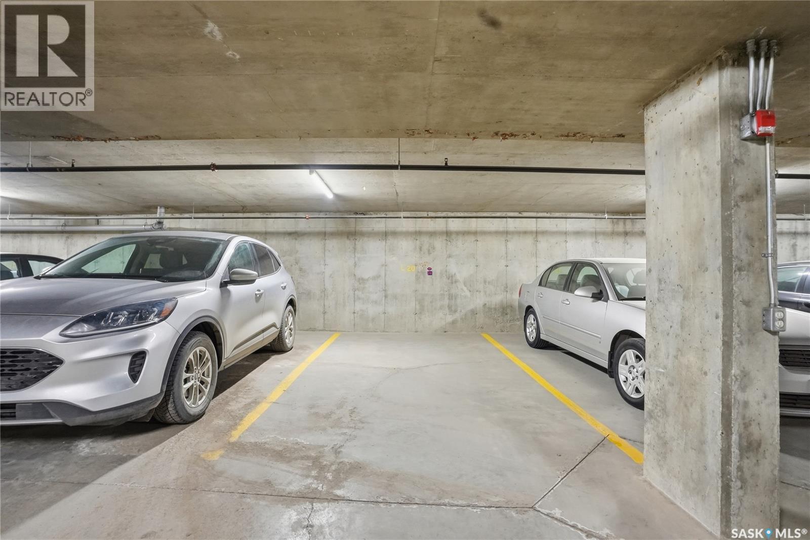 102 2213 Adelaide Street E, Saskatoon, SK - Indoor Photo Showing Garage