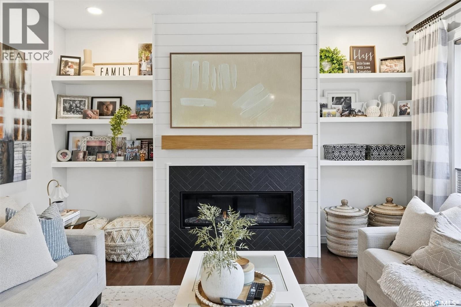 1015 Muzyka Road, Saskatoon, SK - Indoor Photo Showing Living Room With Fireplace