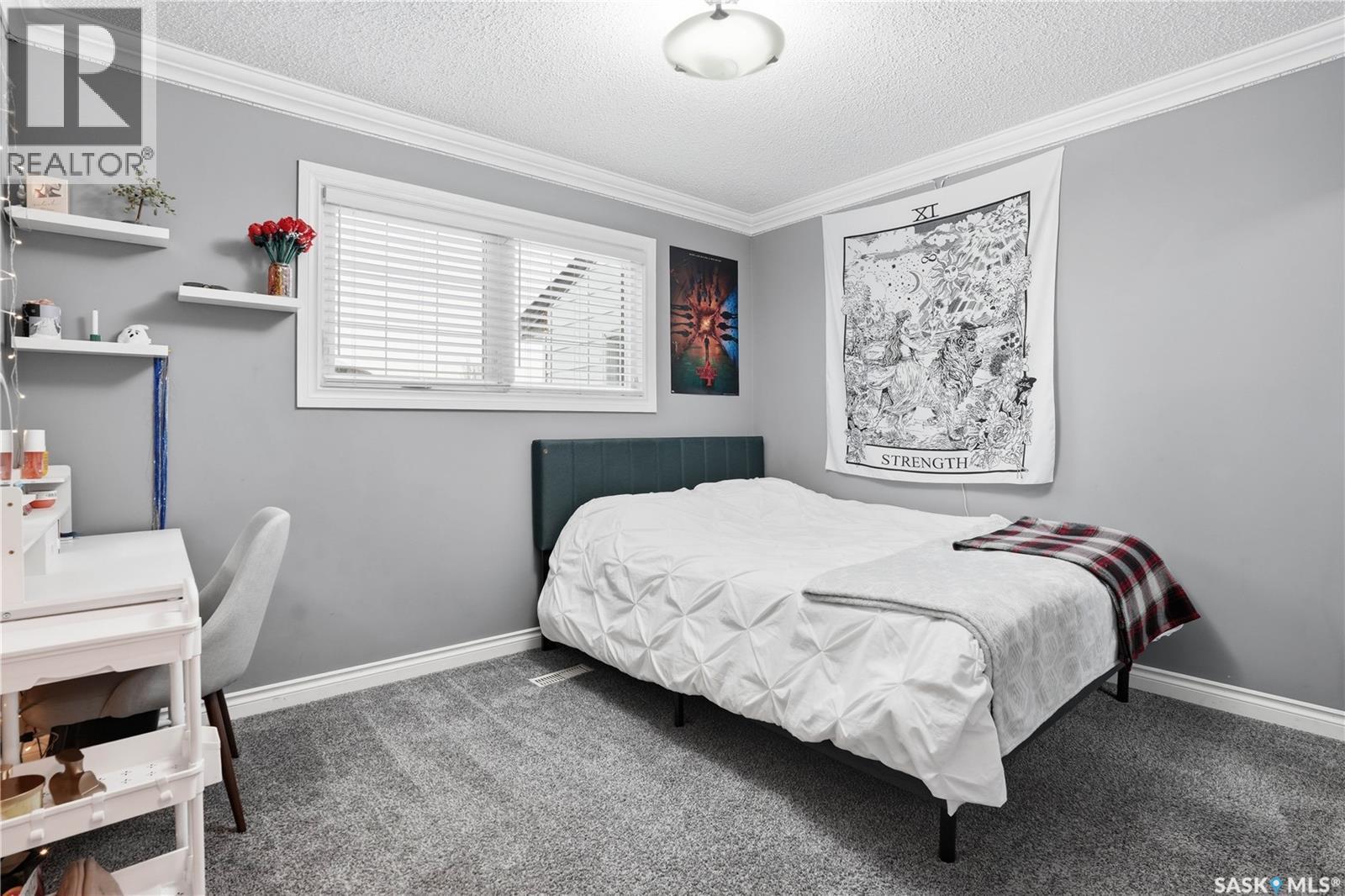 83 Carter Crescent, Regina, SK - Indoor Photo Showing Bedroom