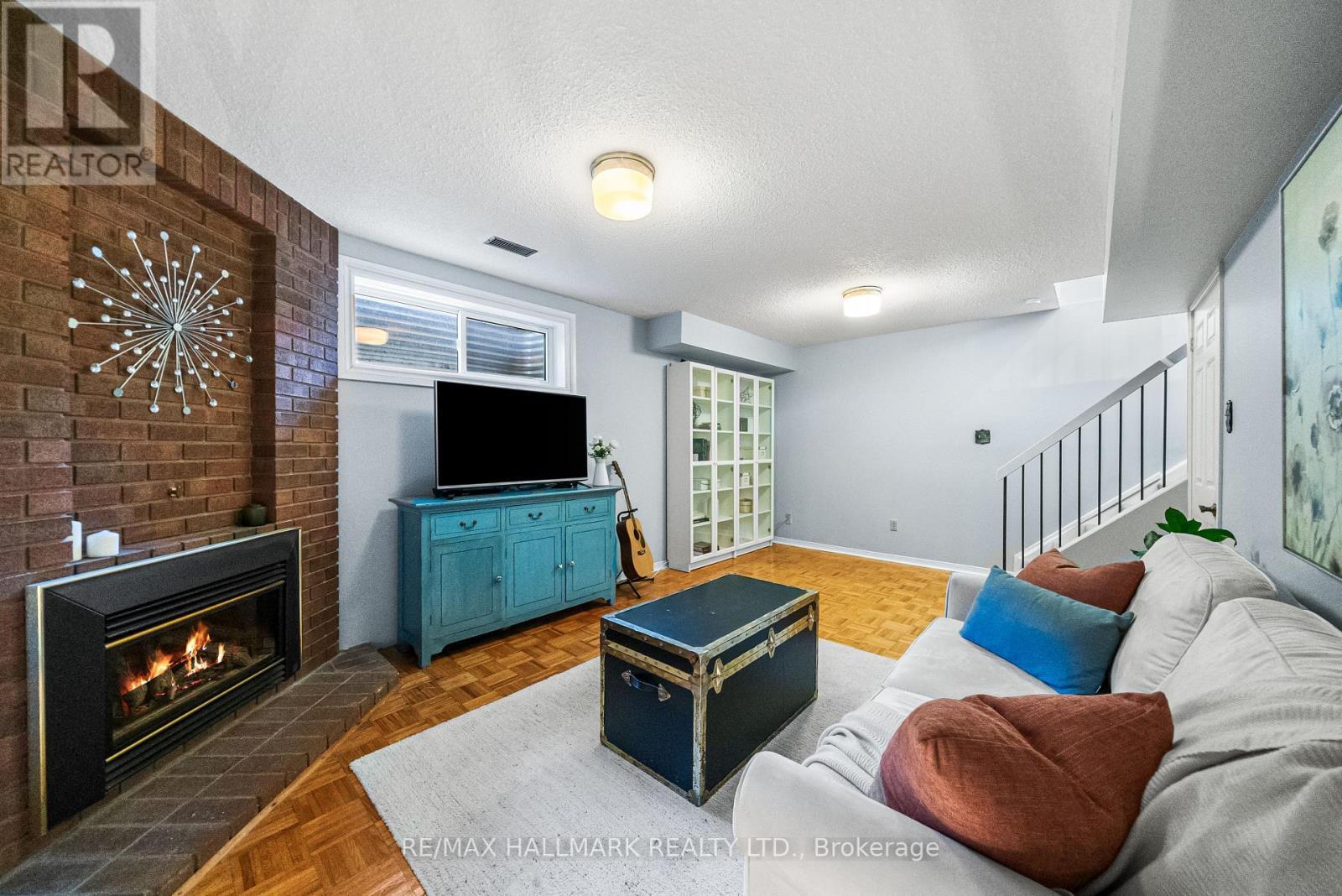 64 Sylvan Valley Way, Toronto, ON - Indoor Photo Showing Living Room With Fireplace