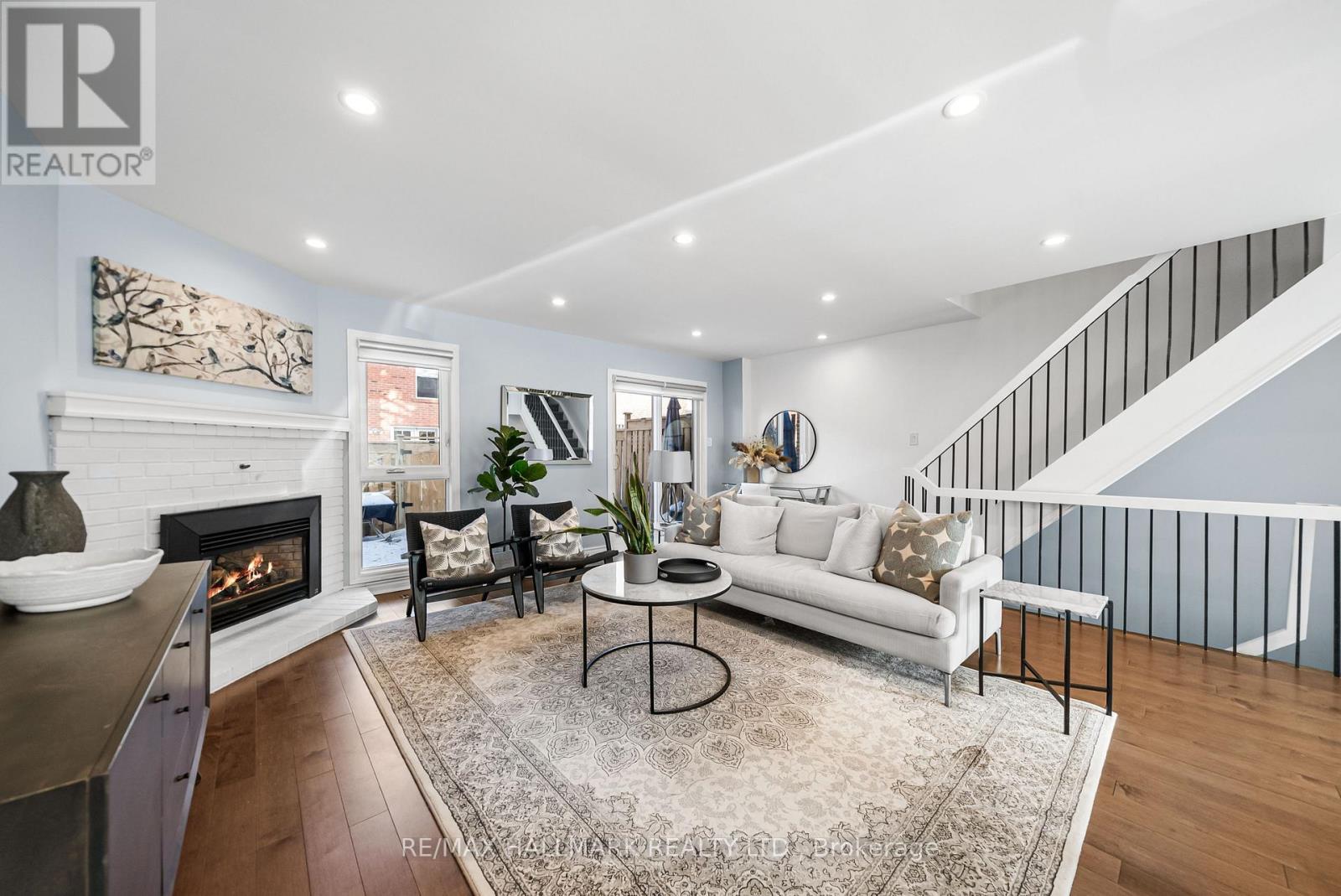 64 Sylvan Valley Way, Toronto, ON - Indoor Photo Showing Living Room With Fireplace