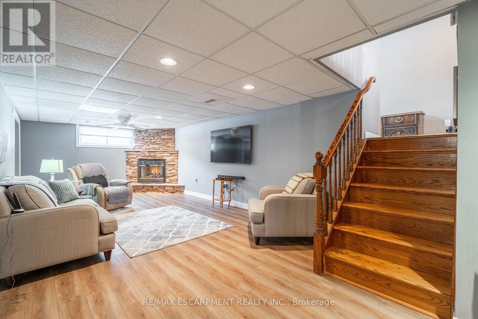 19 Valery Court, Hamilton, ON - Indoor With Fireplace