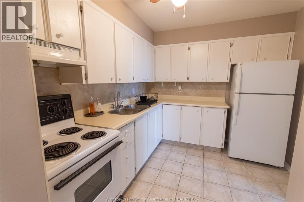 111 Riverside Unit# 404, Windsor, ON - Indoor Photo Showing Kitchen With Double Sink