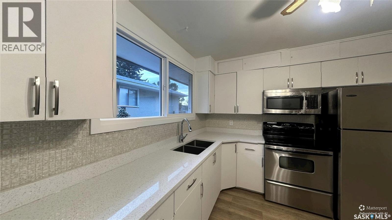 41 Cartier Crescent, Saskatoon, SK - Indoor Photo Showing Kitchen With Double Sink