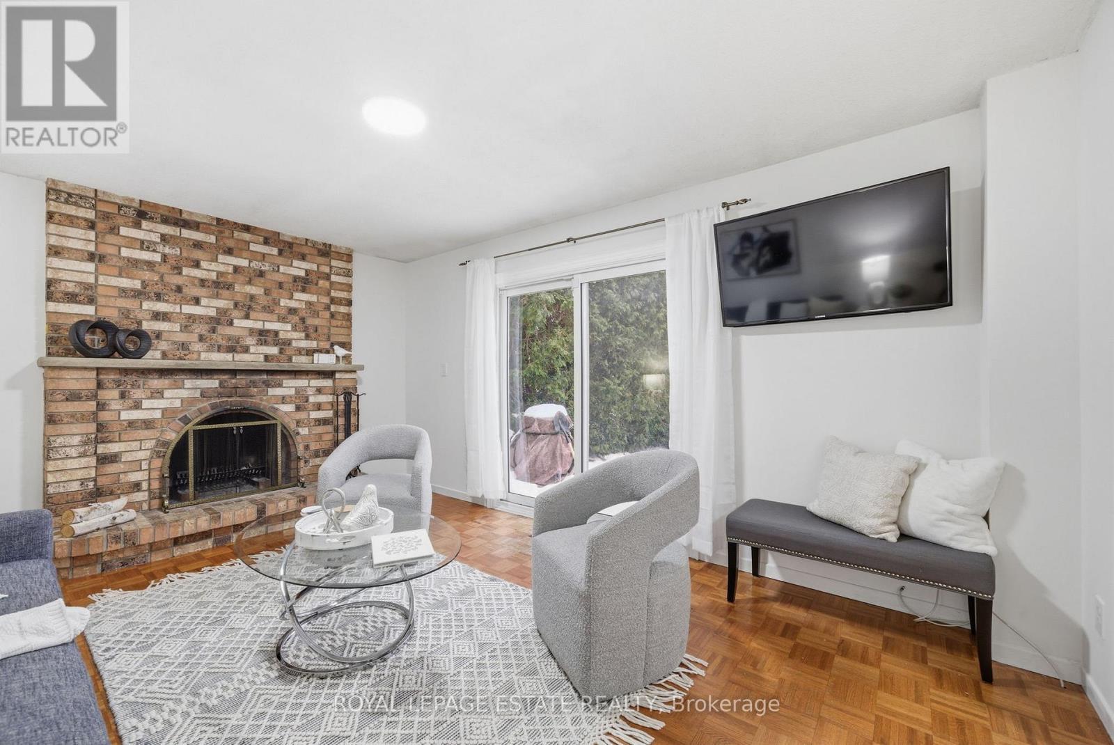 253 Michael Boulevard, Whitby, ON - Indoor Photo Showing Living Room With Fireplace
