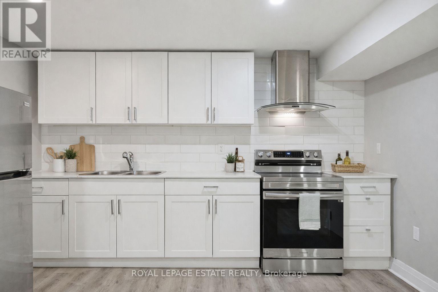 Virtually staged to show potential - 253 Michael Boulevard, Whitby, ON - Indoor Photo Showing Kitchen With Double Sink With Upgraded Kitchen