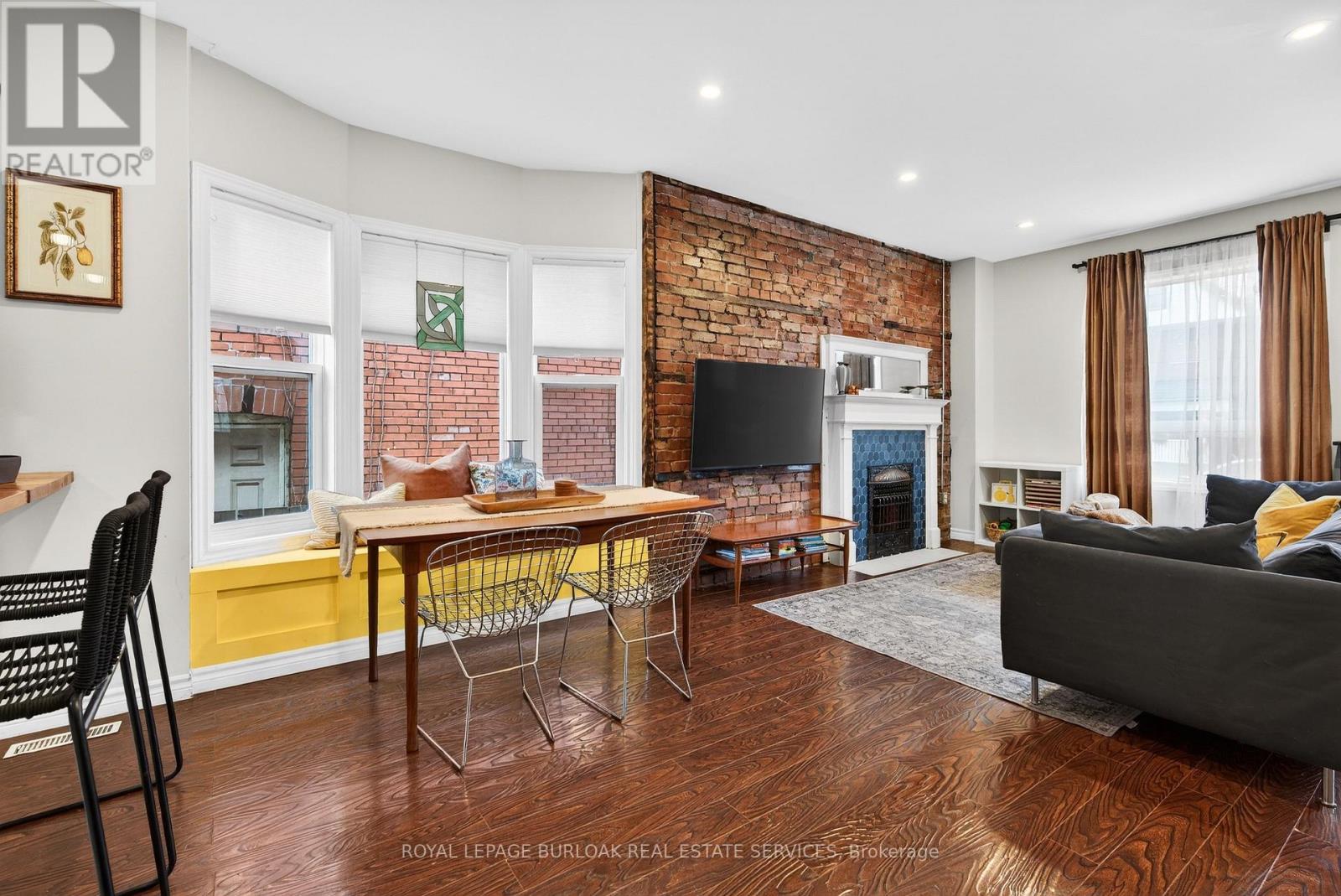 792 Cannon Street E, Hamilton, ON - Indoor Photo Showing Living Room With Fireplace