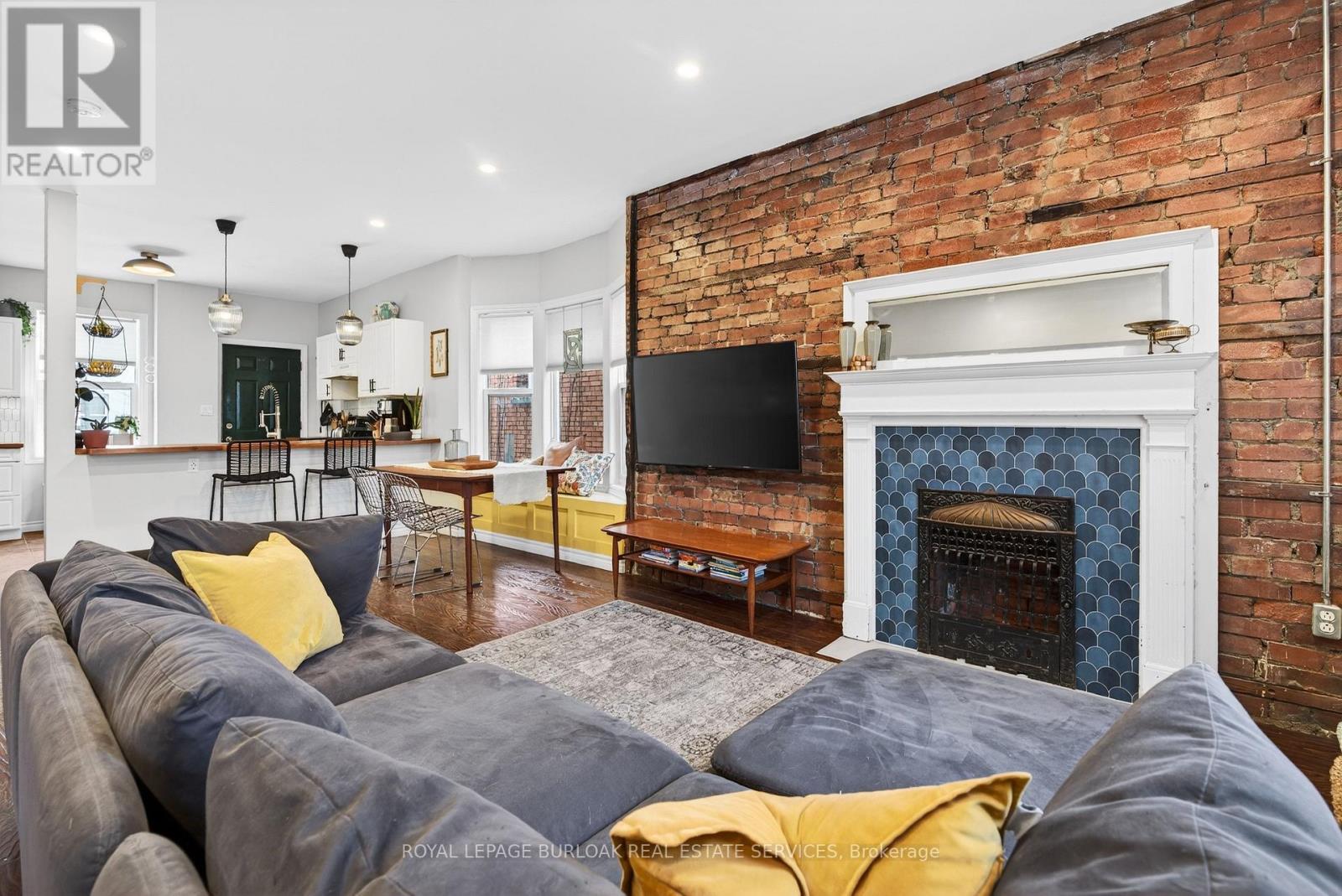 792 Cannon Street E, Hamilton, ON - Indoor Photo Showing Living Room With Fireplace