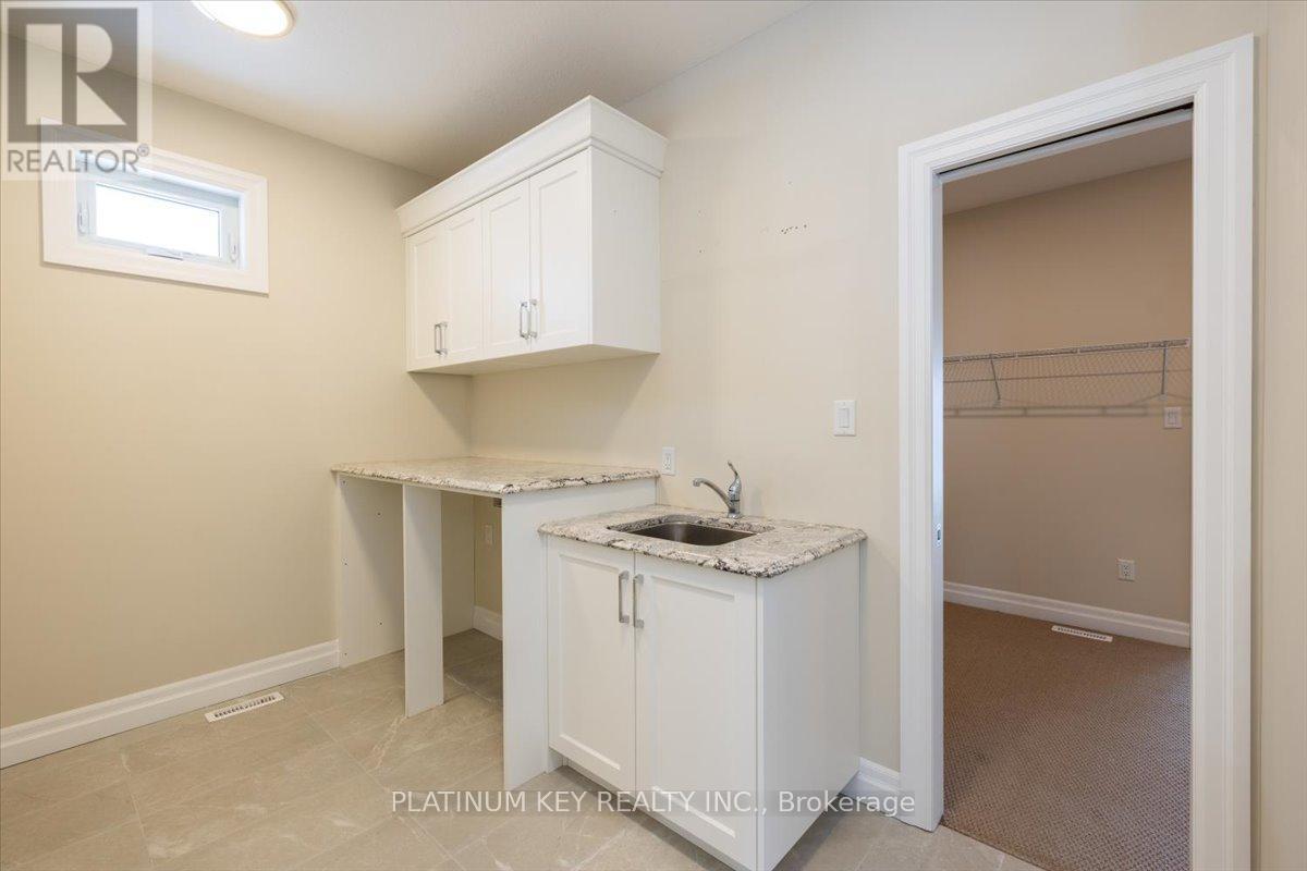 7 Edgeview Crescent, Middlesex Centre (Kilworth), ON - Indoor Photo Showing Laundry Room