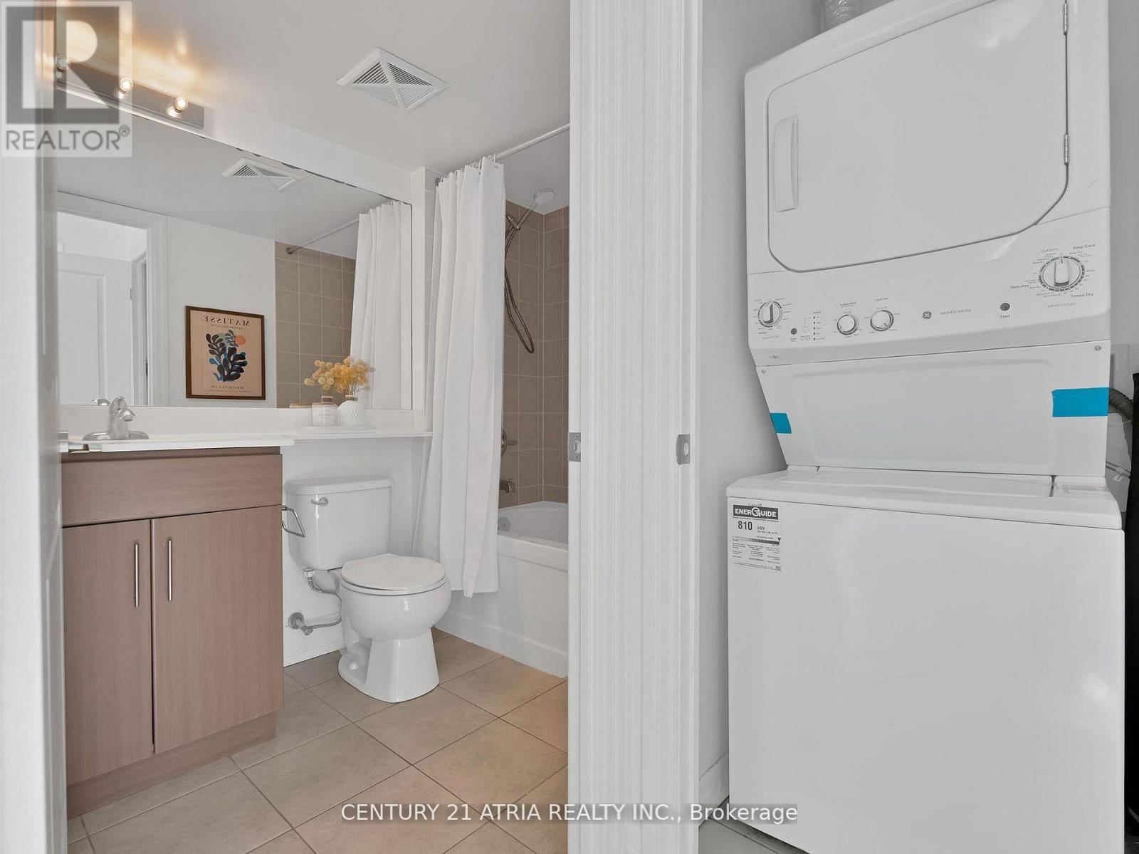 308 - 30 Herons Hills Way, Toronto, ON - Indoor Photo Showing Laundry Room