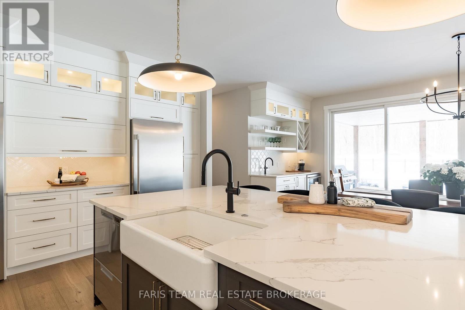 1555 Baseline Road S, Tiny, ON - Indoor Photo Showing Kitchen With Upgraded Kitchen