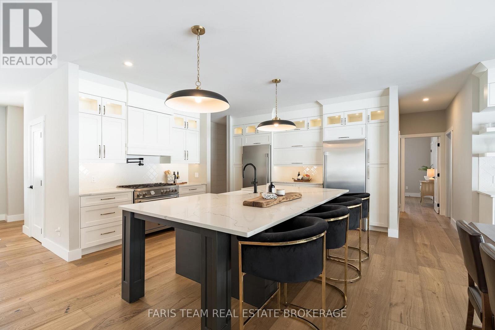 1555 Baseline Road S, Tiny, ON - Indoor Photo Showing Kitchen With Upgraded Kitchen