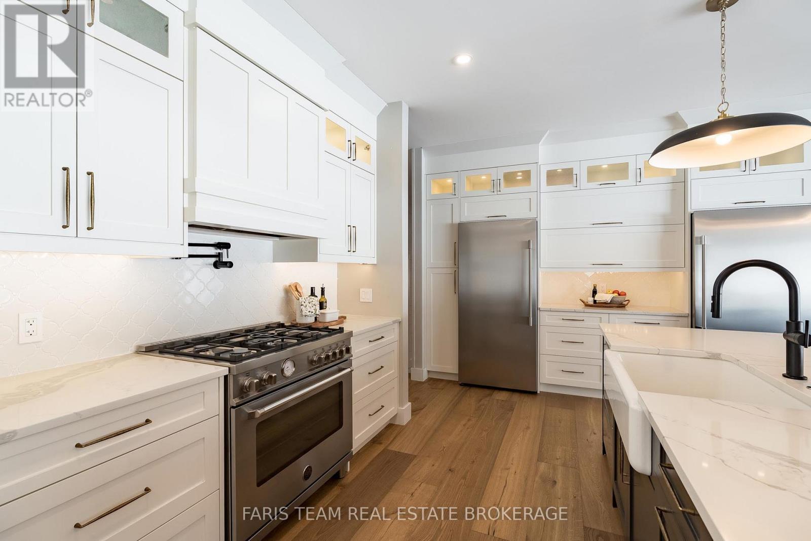 1555 Baseline Road S, Tiny, ON - Indoor Photo Showing Kitchen With Upgraded Kitchen