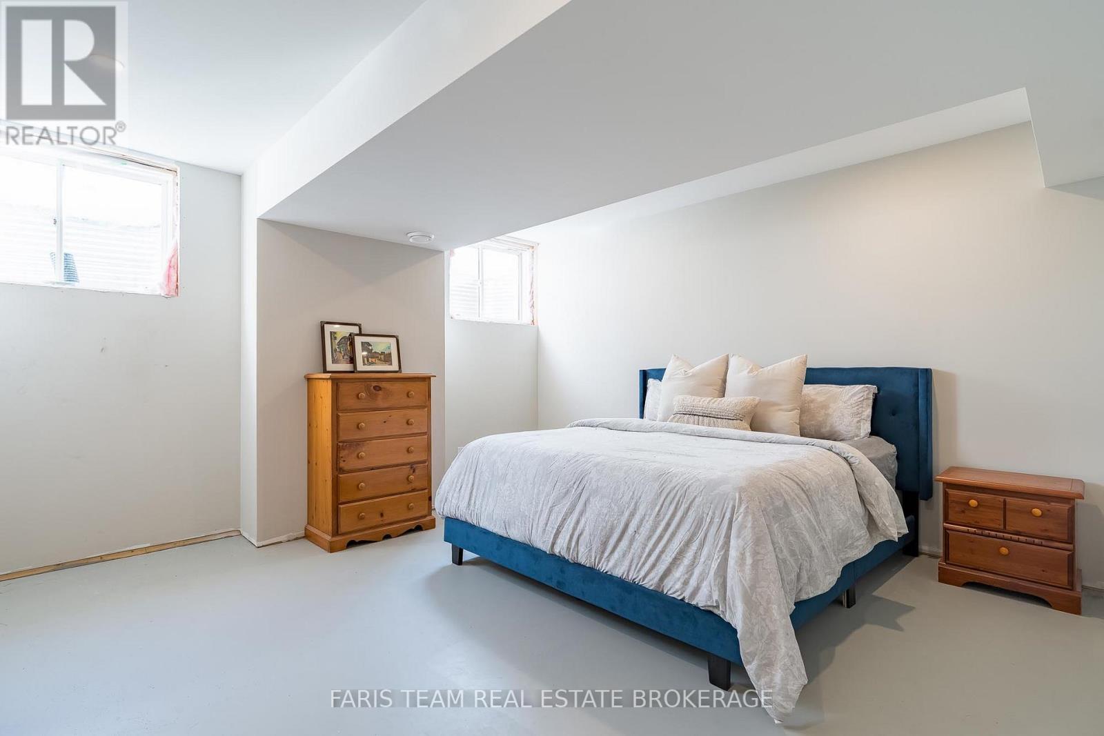 1555 Baseline Road S, Tiny, ON - Indoor Photo Showing Bedroom