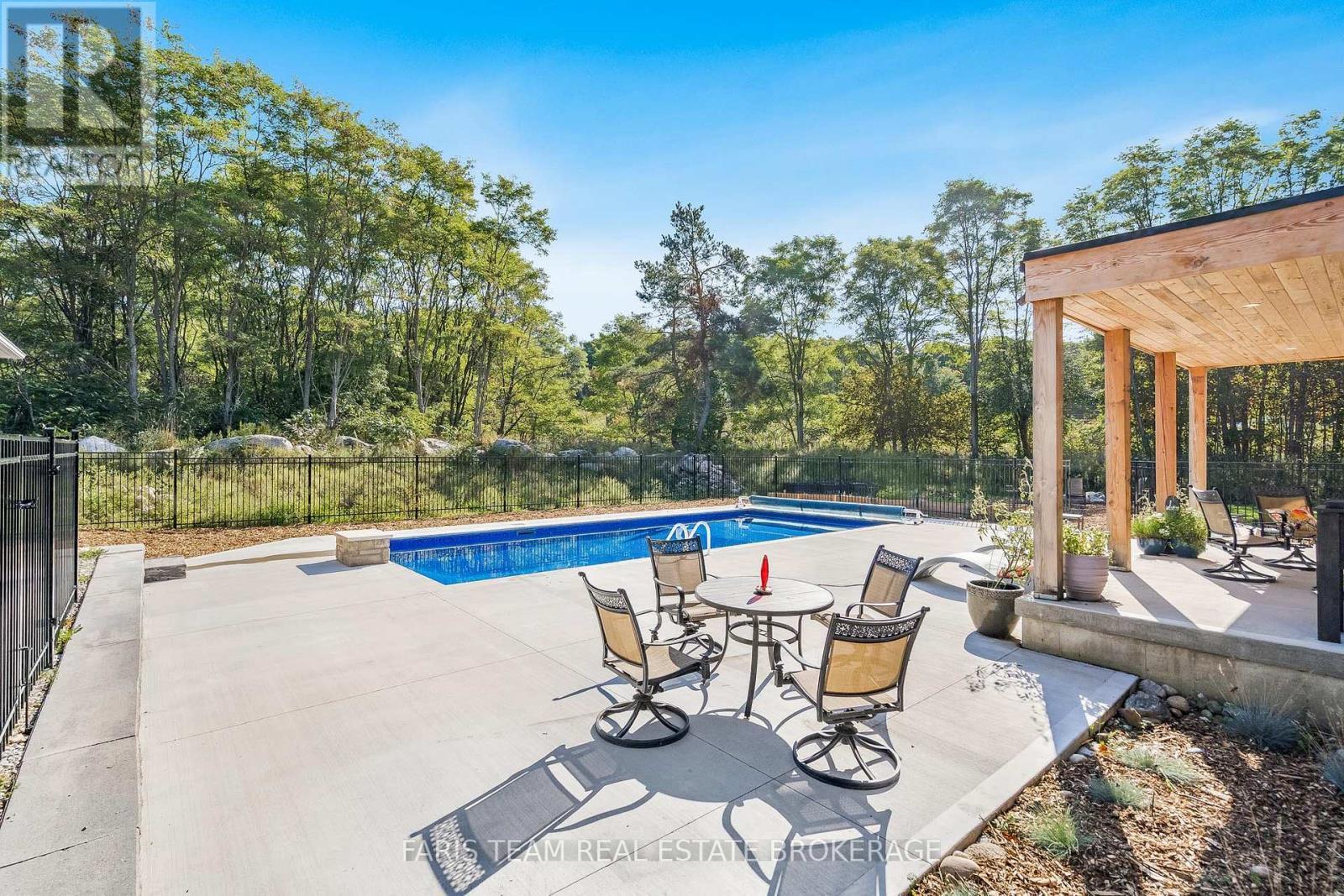 1555 Baseline Road S, Tiny, ON - Outdoor With In Ground Pool With Backyard