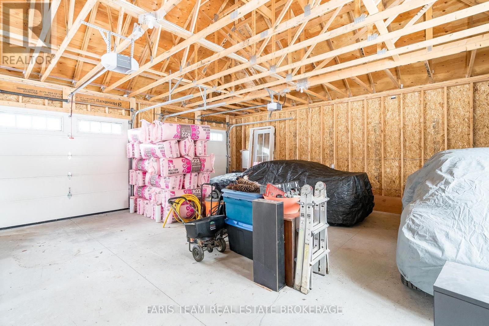 1555 Baseline Road S, Tiny, ON - Indoor Photo Showing Garage