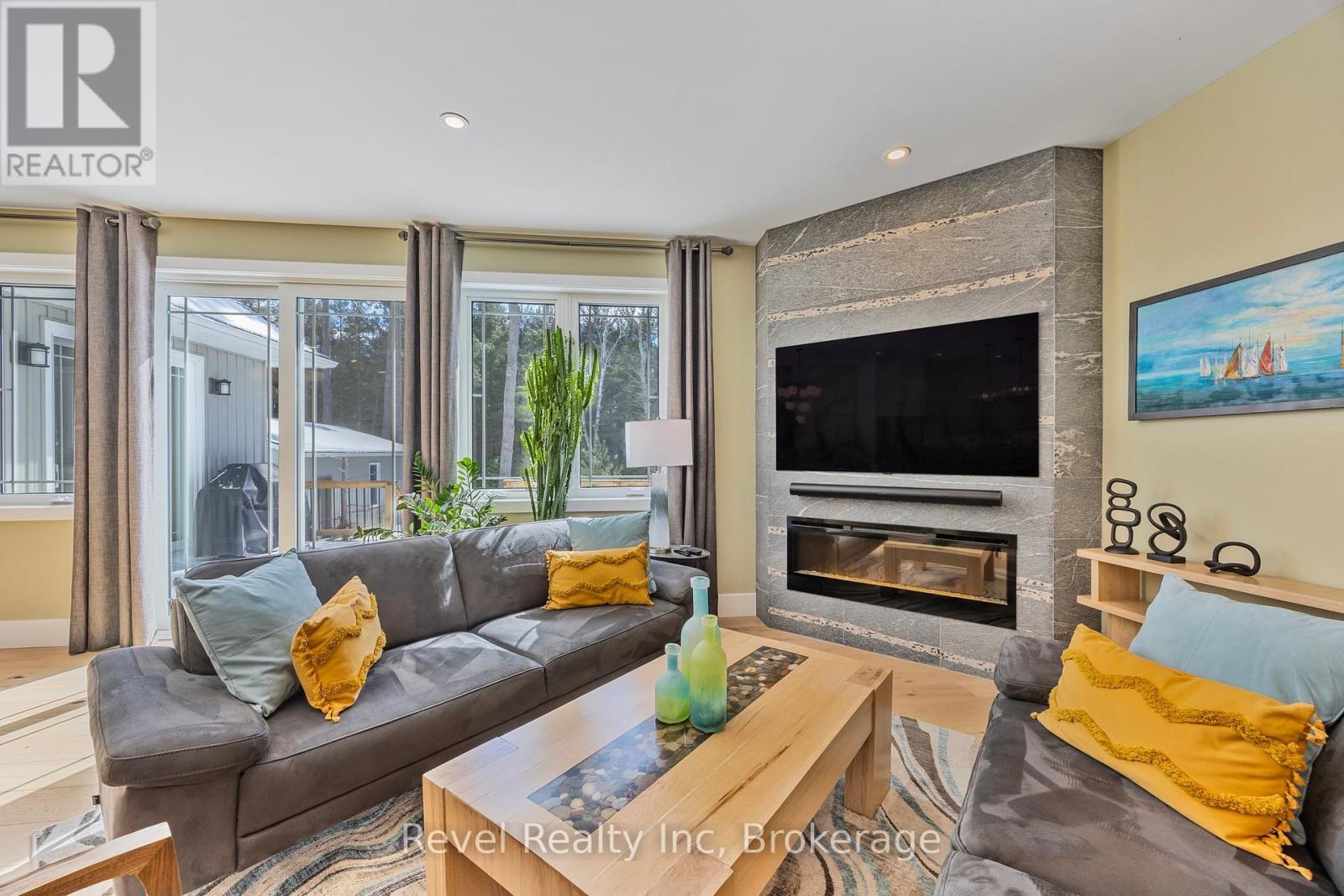 15 Stoney Road, Tiny, ON - Indoor Photo Showing Living Room With Fireplace