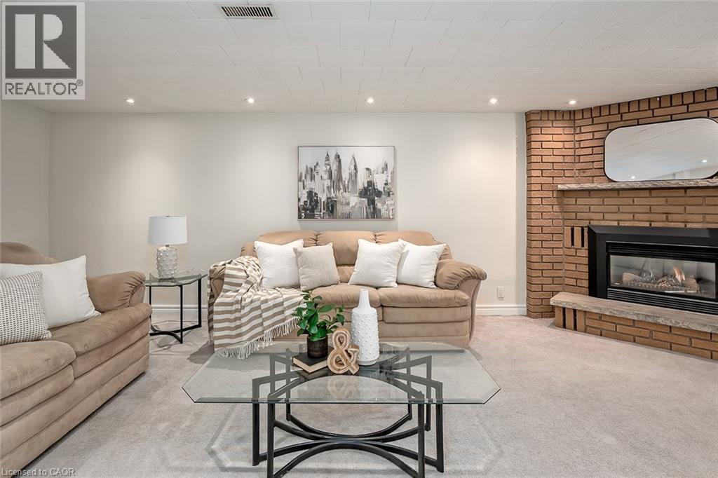 33 Gemini Drive, Hamilton, ON - Indoor Photo Showing Living Room With Fireplace