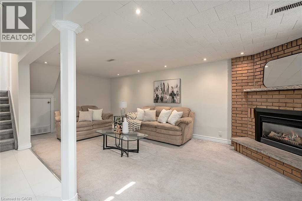 33 Gemini Drive, Hamilton, ON - Indoor Photo Showing Living Room With Fireplace