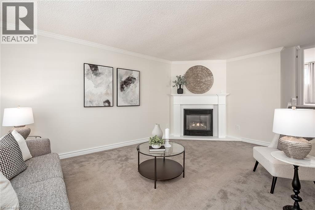 33 Gemini Drive, Hamilton, ON - Indoor Photo Showing Living Room With Fireplace