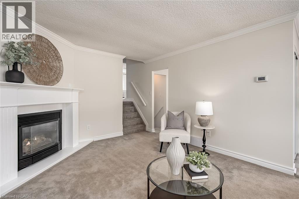33 Gemini Drive, Hamilton, ON - Indoor Photo Showing Living Room With Fireplace