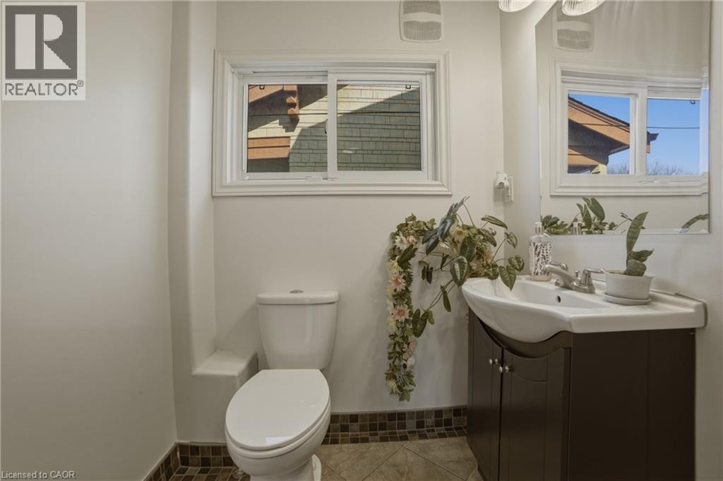Main floor two peice bathroom! - 81 Ottawa Street N, Hamilton, ON - Indoor Photo Showing Bathroom