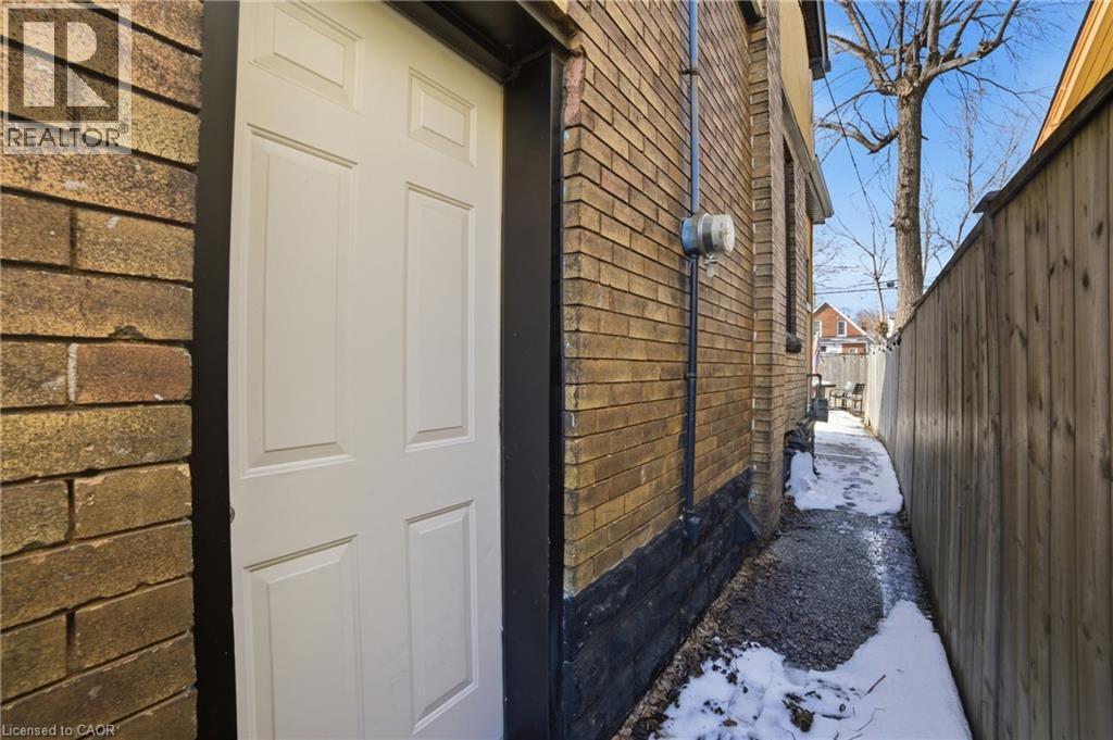 Separate side entrance to basement! - 81 Ottawa Street N, Hamilton, ON - Outdoor With Exterior
