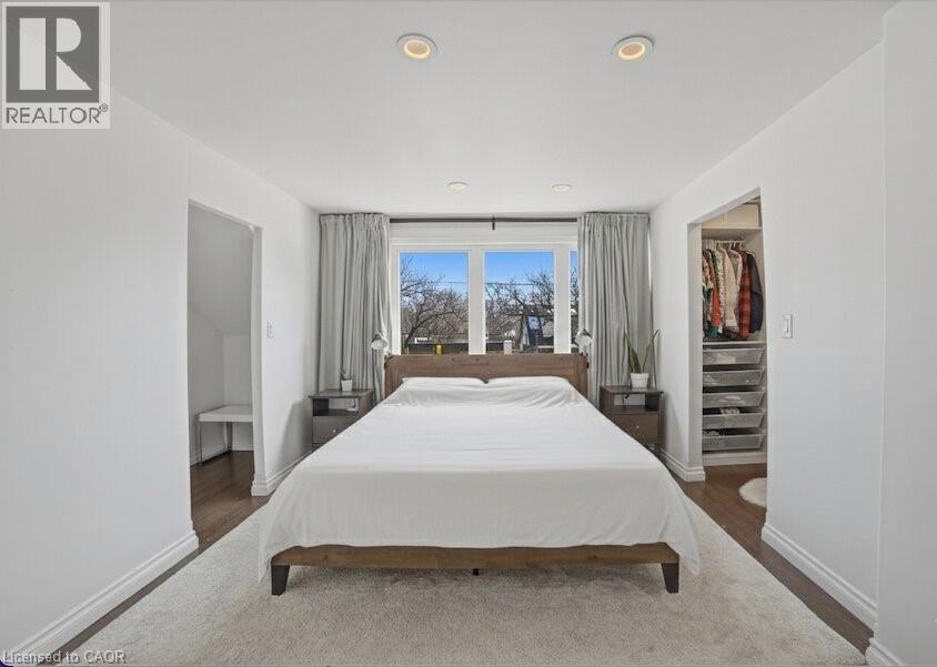 Primary bedroom with walk in closet! - 81 Ottawa Street N, Hamilton, ON - Indoor Photo Showing Bedroom