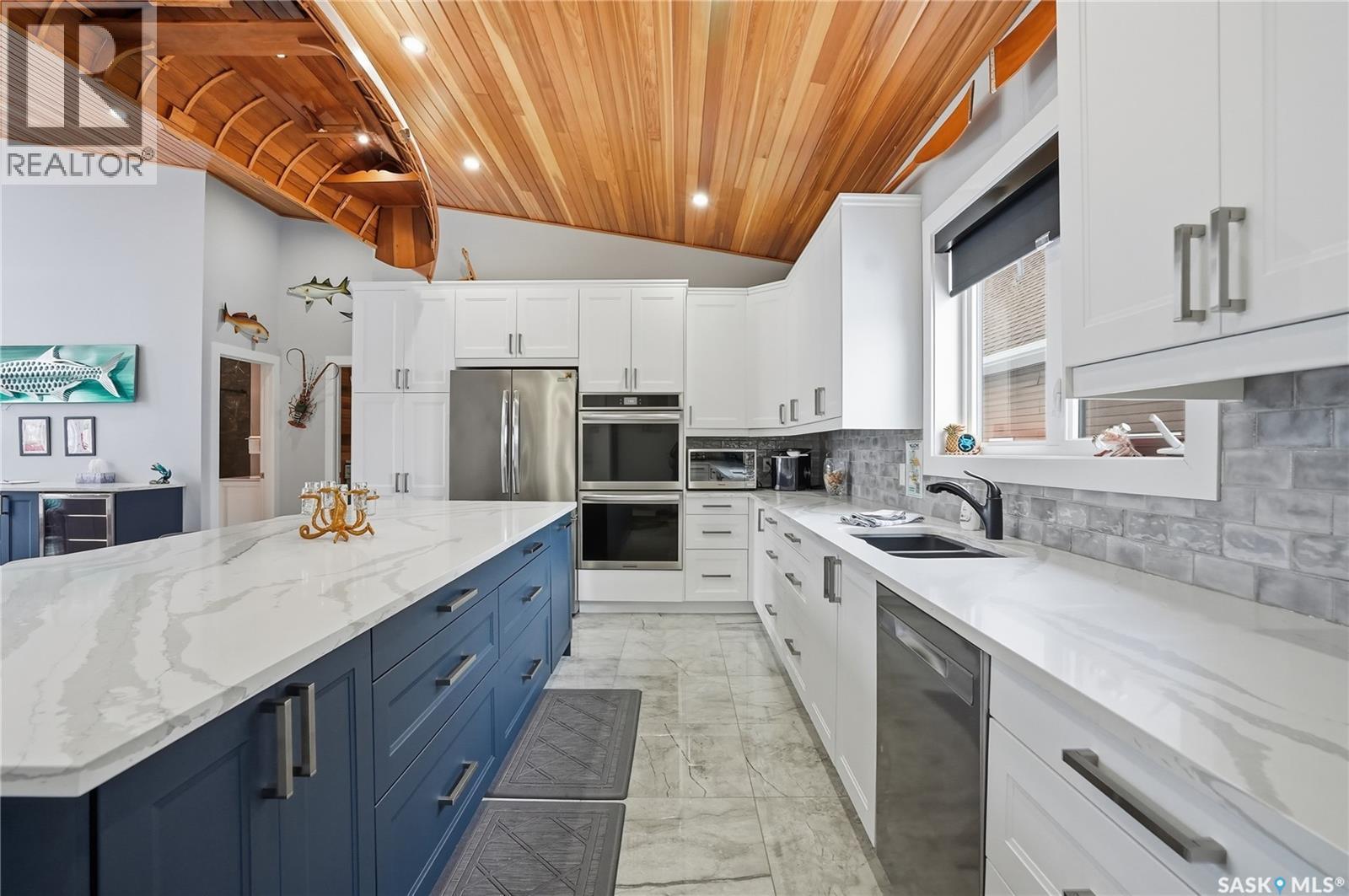 2 Bruin Boulevard, Candle Lake, SK - Indoor Photo Showing Kitchen With Double Sink With Upgraded Kitchen