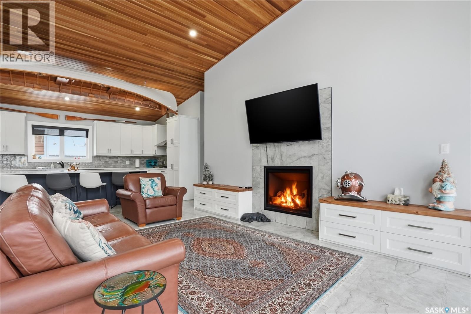 2 Bruin Boulevard, Candle Lake, SK - Indoor Photo Showing Living Room With Fireplace