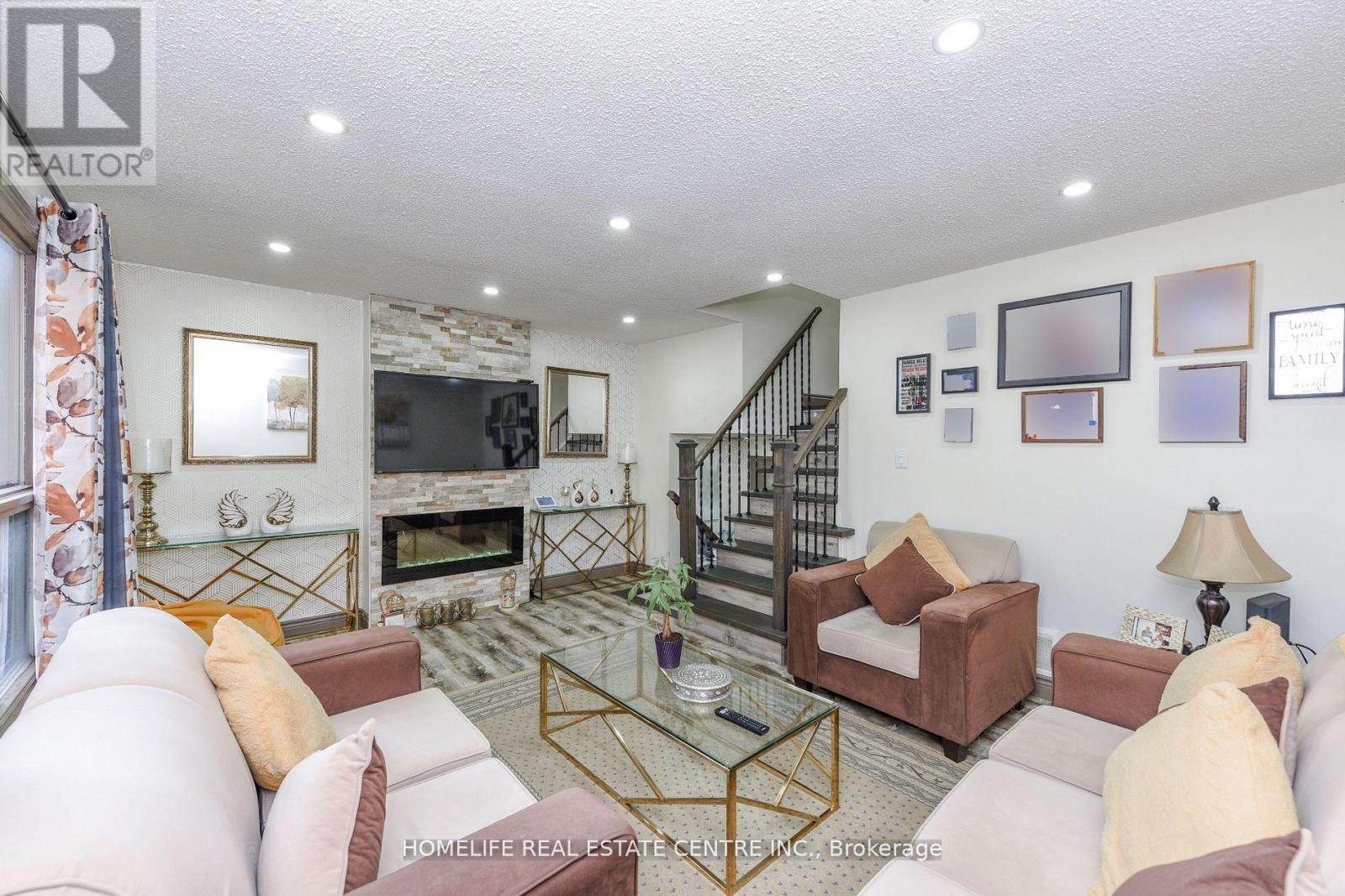 20 Oleander Crescent, Brampton, ON - Indoor Photo Showing Living Room With Fireplace