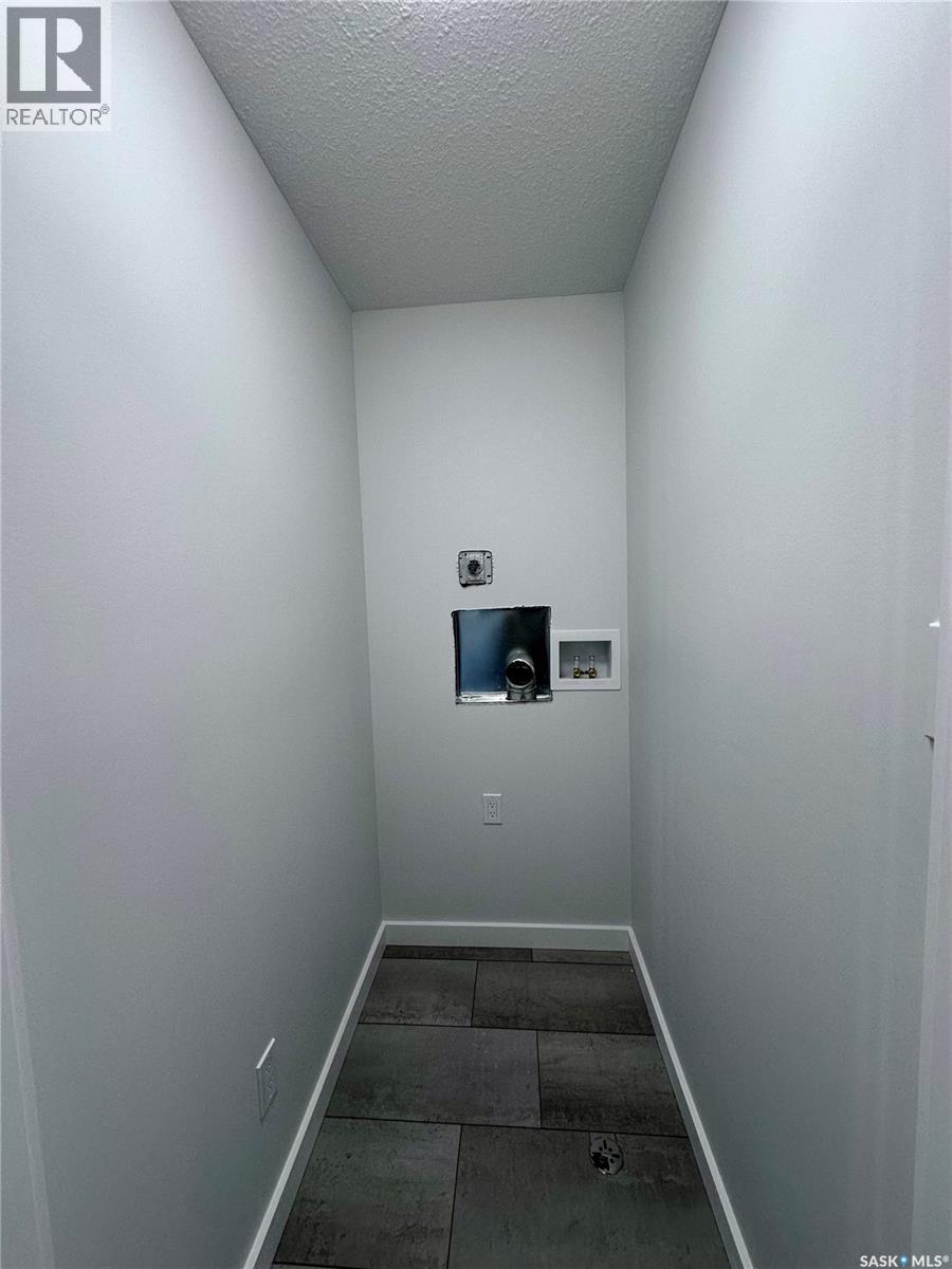 5457 Buckingham Drive E, Regina, SK - Indoor Photo Showing Other Room