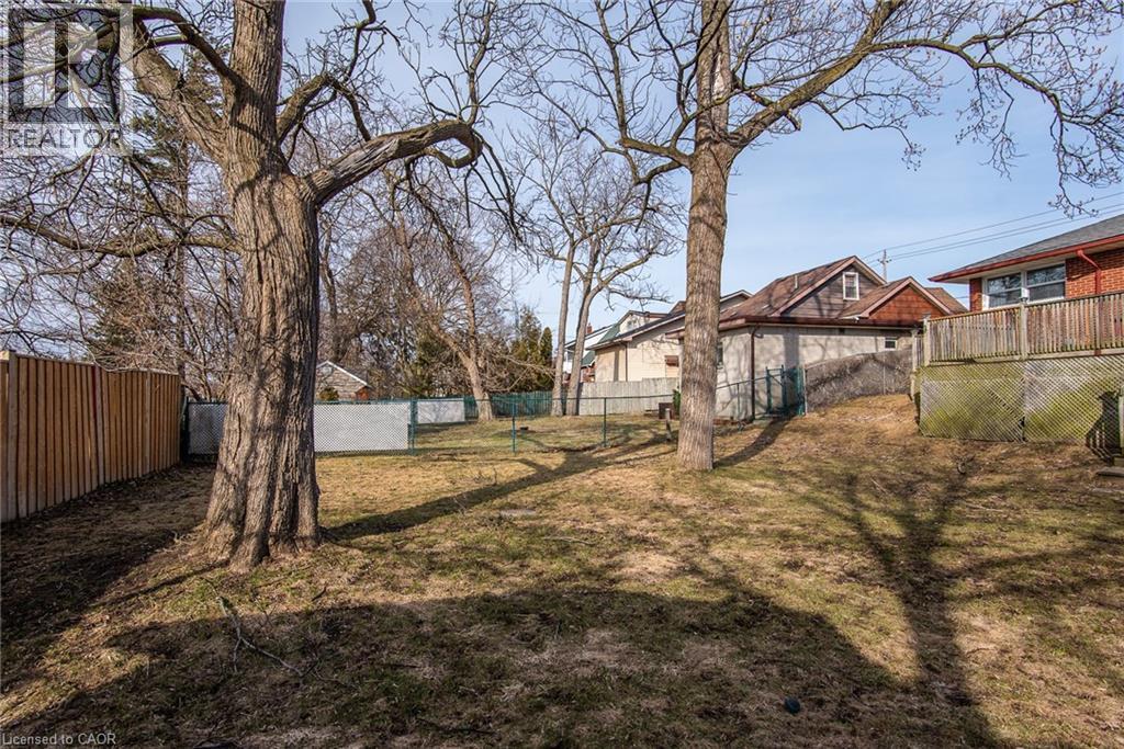 View of fenced backyard - 120 Fourth Avenue, Kitchener, ON