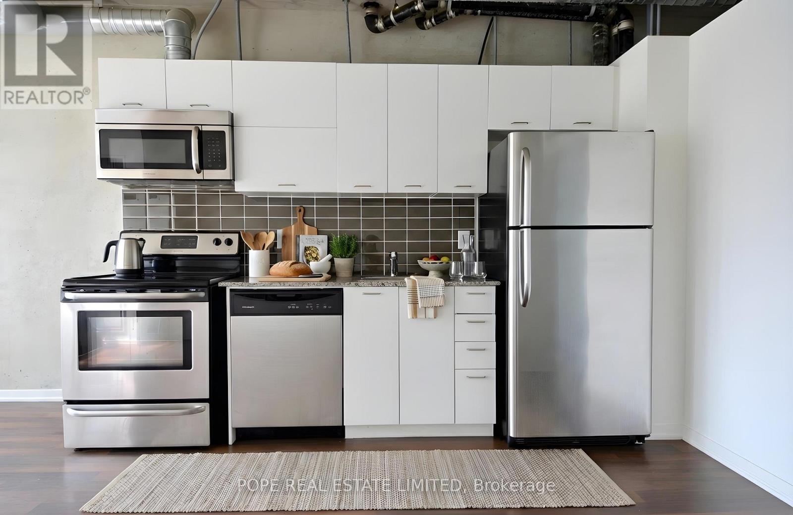 Virtual Staging - Kitchen - 312 - 38 Joe Shuster Way, Toronto, ON - Indoor Photo Showing Kitchen With Stainless Steel Kitchen