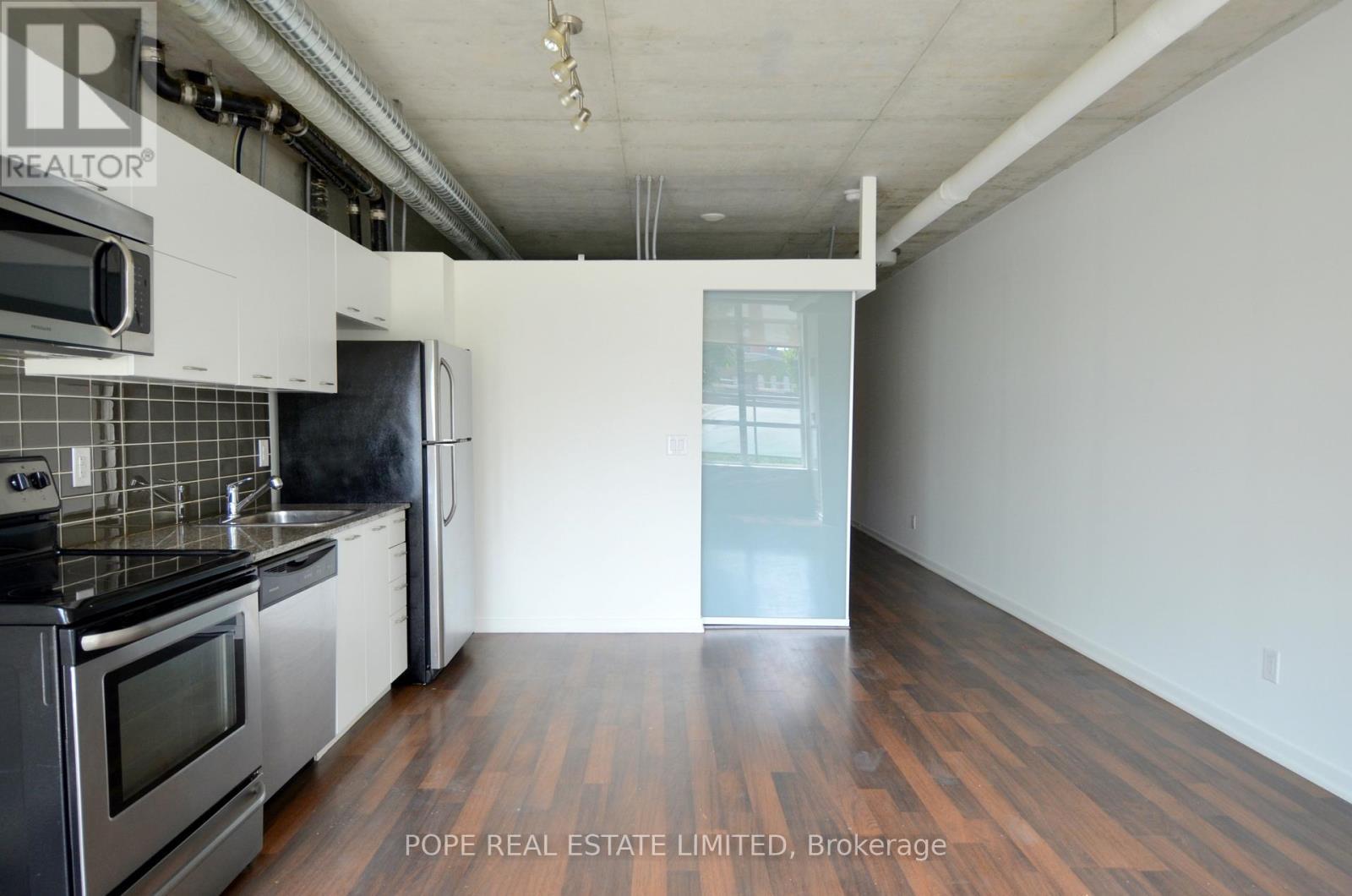 Dining Room 1 - 312 - 38 Joe Shuster Way, Toronto, ON - Indoor Photo Showing Kitchen