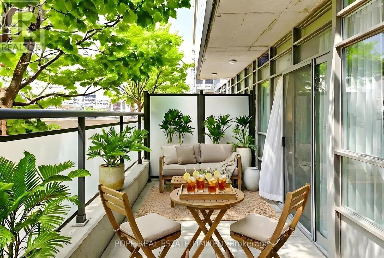 Virtual Staging - Terrace looking west - 312 - 38 Joe Shuster Way, Toronto, ON - Outdoor