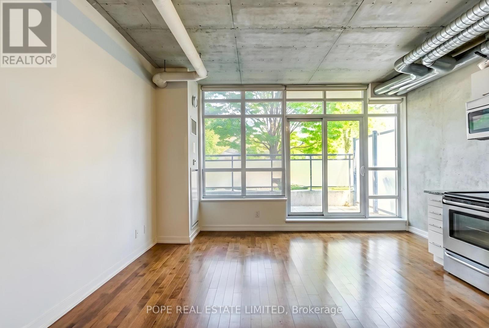 Living Room 3 - 312 - 38 Joe Shuster Way, Toronto, ON - Indoor Photo Showing Other Room