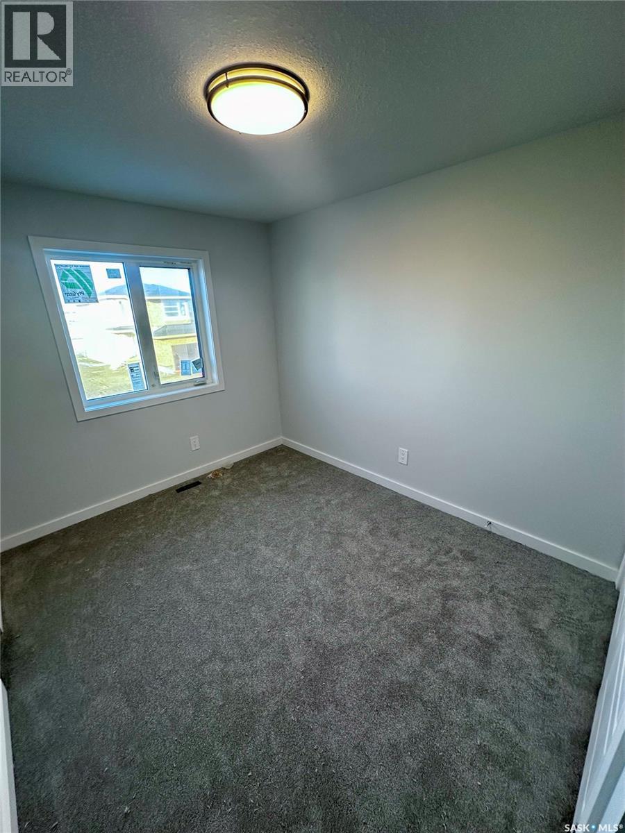 1123 Camden Gardens, White City, SK - Indoor Photo Showing Other Room