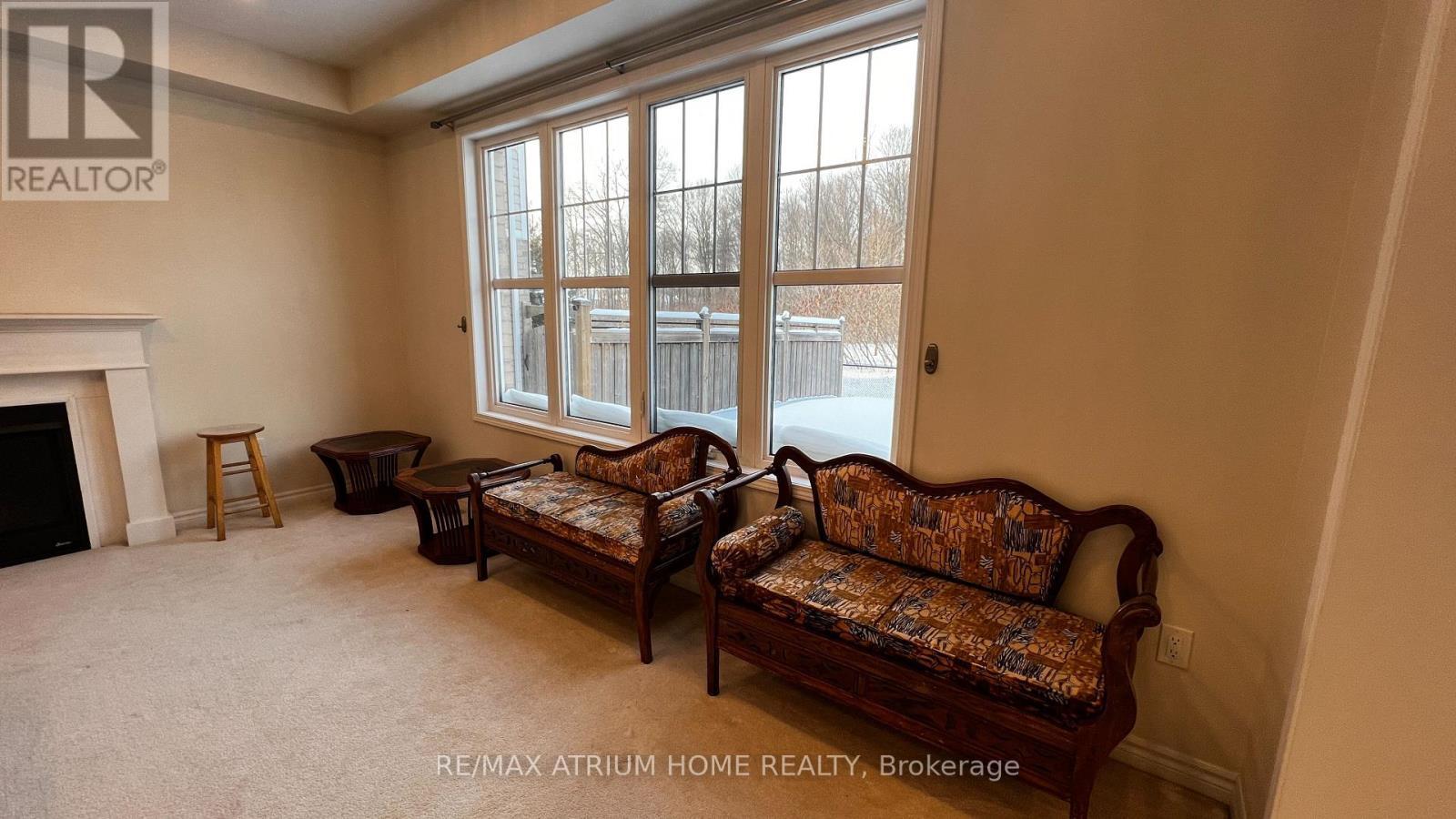 Family Room - 2 Forest Grove Lane, Kitchener, ON - Indoor With Fireplace