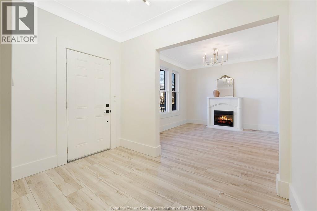 785 Hall #Main, Windsor, ON - Indoor Photo Showing Other Room With Fireplace