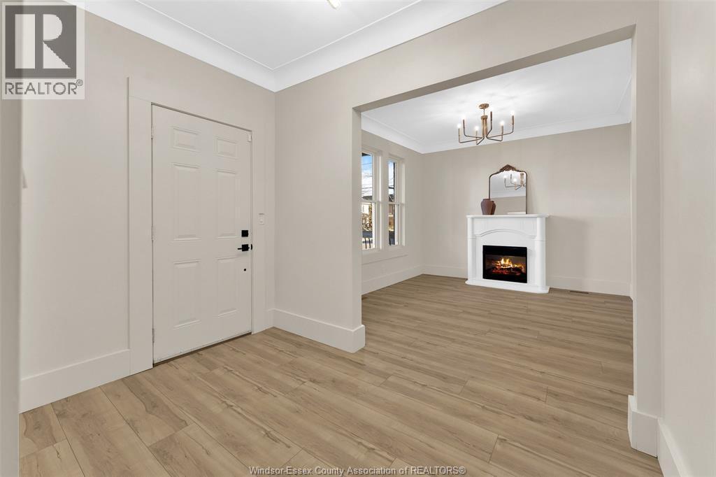 785 Hall #Main, Windsor, ON - Indoor Photo Showing Other Room With Fireplace