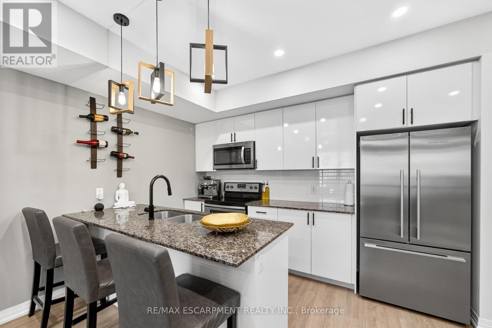 107 - 1206 Main Street E, Milton, ON - Indoor Photo Showing Kitchen With Double Sink With Upgraded Kitchen